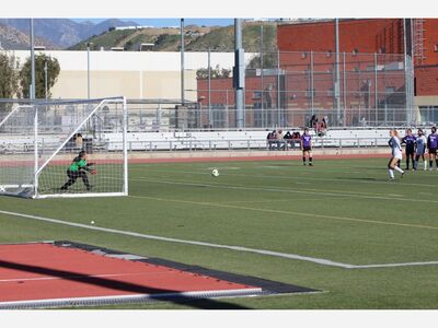 Dons Win with Windy Conditions